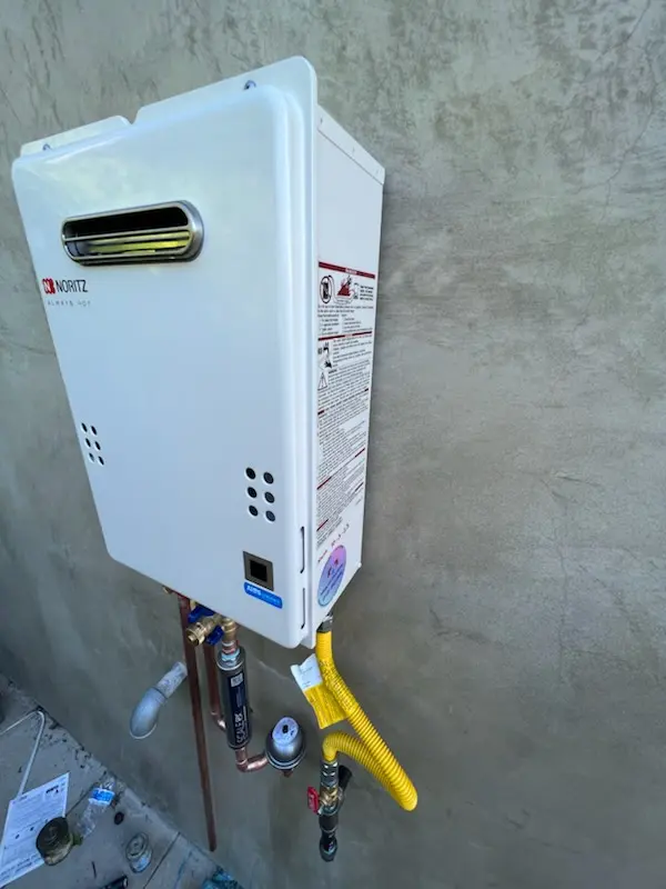 Tankless water heater installation for Marquette's Crossing West homes